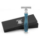 Blue-handled razor with silver blade and Haryali London packaging on a white background