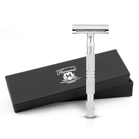 A stainless steel double edge safety razor with a textured grip, displayed alongside its black lather pouch packaging.