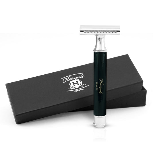 A black double edge safety razor with a branded cap, on a white background.